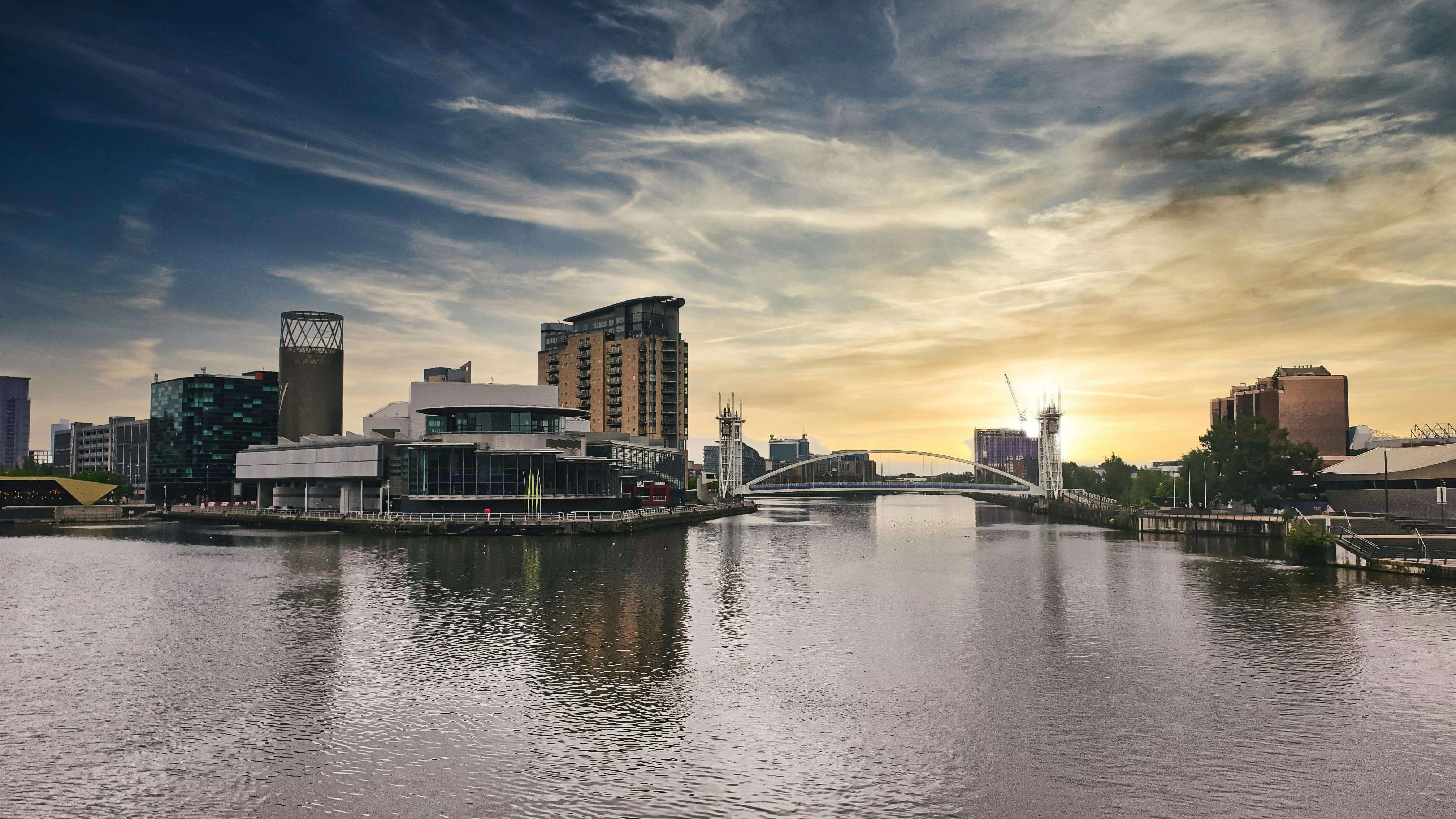 Buildings and bridge over a river in Manchester